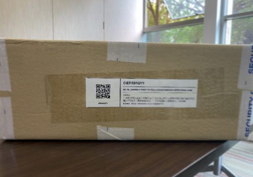 A box with a QR code pasted on the side for less than container load shipping.